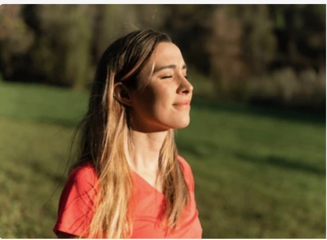 Person practicing self-care and setting boundaries