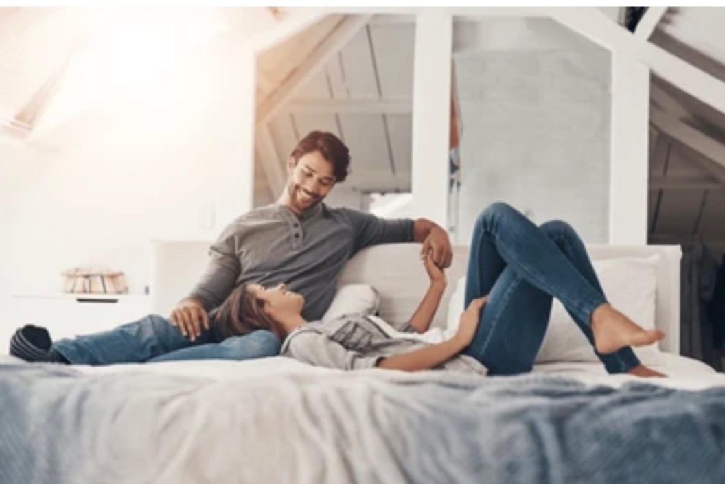 Couple in therapy session working on emotional connection through EFT